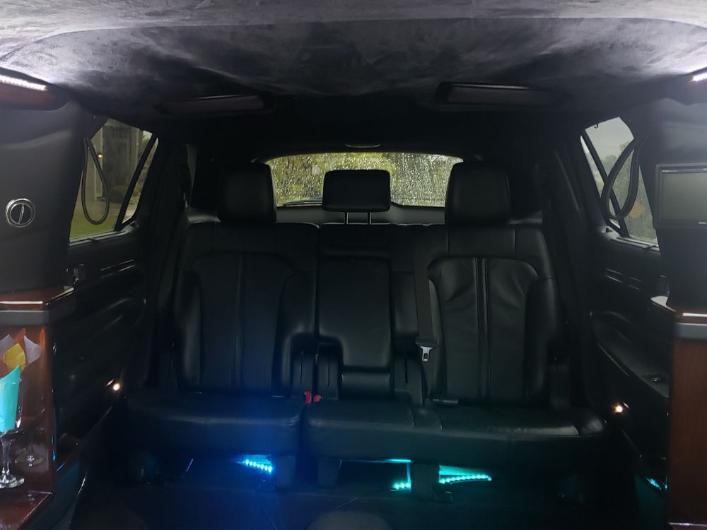 Forward-facing rear bench inside Lincoln MKT Limousine